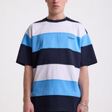 Navy, blue and white stripe crew neck t-shirt with embroidered Rockport logo, worn by model