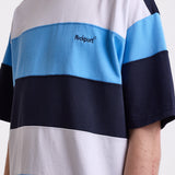 Navy, blue and white stripe crew neck t-shirt with embroidered Rockport logo, worn by model