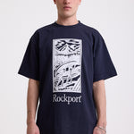 Navy crew neck t-shirt with printed ourdoor-inspired graphic and Rockport logo, worn by model