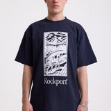 Navy crew neck t-shirt with printed ourdoor-inspired graphic and Rockport logo, worn by model