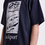 Navy crew neck t-shirt with printed ourdoor-inspired graphic and Rockport logo, worn by model