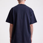 Navy crew neck t-shirt with printed ourdoor-inspired graphic and Rockport logo, worn by model