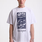 White crew neck t-shirt with printed ourdoor-inspired graphic and Rockport logo, worn by model
