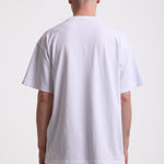 White crew neck t-shirt with printed ourdoor-inspired graphic and Rockport logo, worn by model