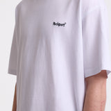 White pique crew neck t-shirt with navy Rockport embroidery, worn by model