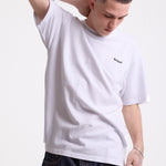 White pique crew neck t-shirt with navy Rockport embroidery, worn by model