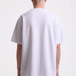 White pique crew neck t-shirt with navy Rockport embroidery, worn by model