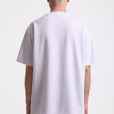 White pique crew neck t-shirt with navy Rockport embroidery, worn by model