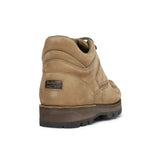 Rockport khaki tan nubuck leather hiker boot with black sole on a white background