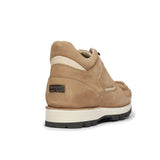 Rockport beige hiker boot with white sole on a white background