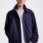 Classic navy harrington jacket with embroidered rockport logo, worn by model