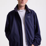 Classic navy harrington jacket with embroidered rockport logo, worn by model
