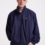 Classic navy harrington jacket with embroidered rockport logo, worn by model